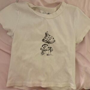 Brandy Melville Cream Crop Top with Graphic Design